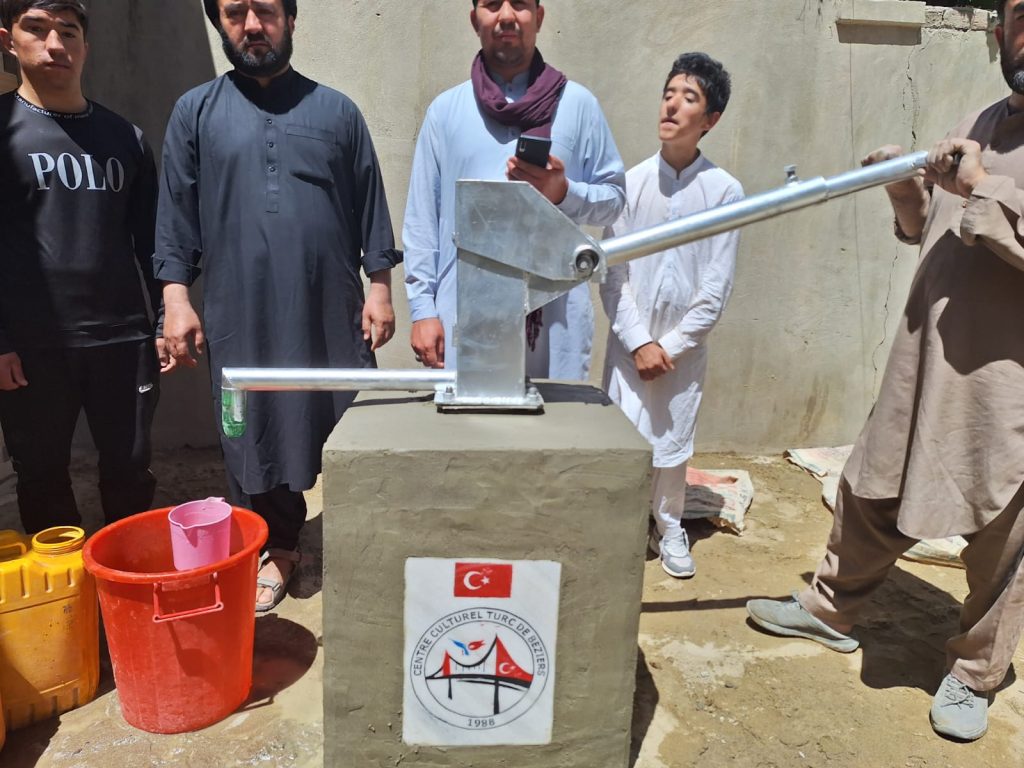 Al Rehman aid help water pomp to poor people in afghanistan